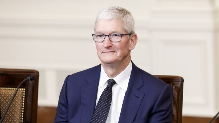 Rephrase the title:Apple shares slip on report US government preparing antitrust lawsuit