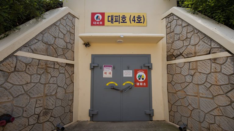 Rephrase the title:North Korea fires 200 artillery shells near Yeonpyeong Island