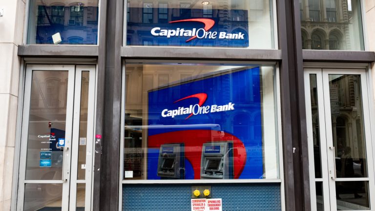 Rephrase the title:Capital One acquiring Discover Financial Services, report says